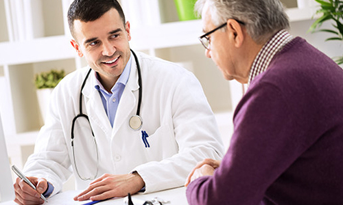 Doctor speaking to patient